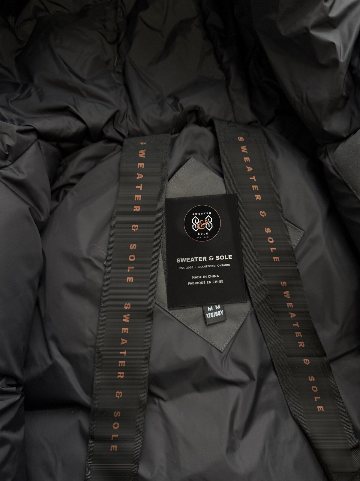 S&S Hooded Parka in Black, Sweater & Sole neck label and lining